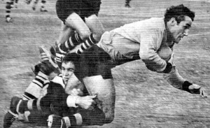Jim Cody tackling Keith Outton